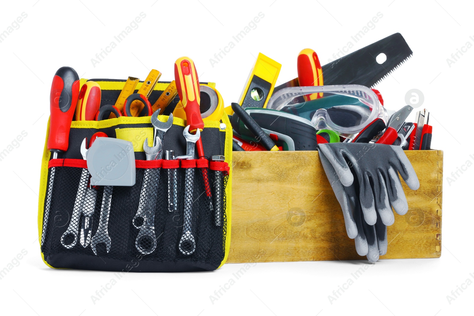 Photo of Wooden box with different tools isolated on white