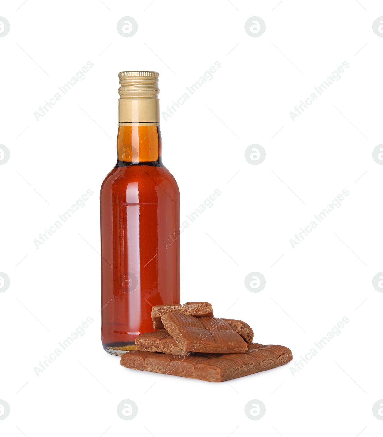 Photo of Bottle of delicious syrup for coffee and caramel candies isolated on white