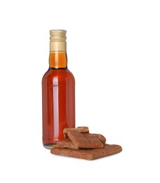 Bottle of delicious syrup for coffee and caramel candies isolated on white