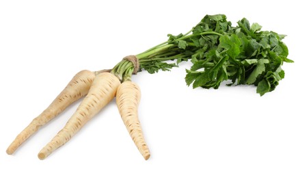 Photo of Tasty fresh ripe parsnips on white background