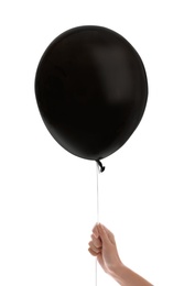 Photo of Woman holding black balloon for Halloween party on white background, closeup