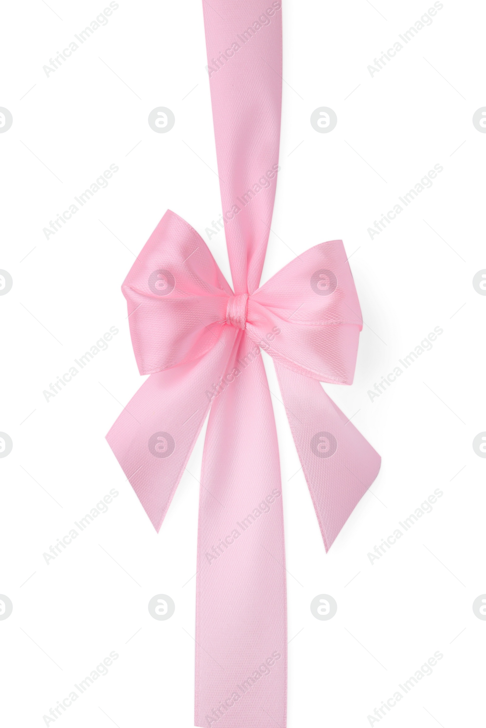 Photo of Pink satin ribbon with bow isolated on white, top view