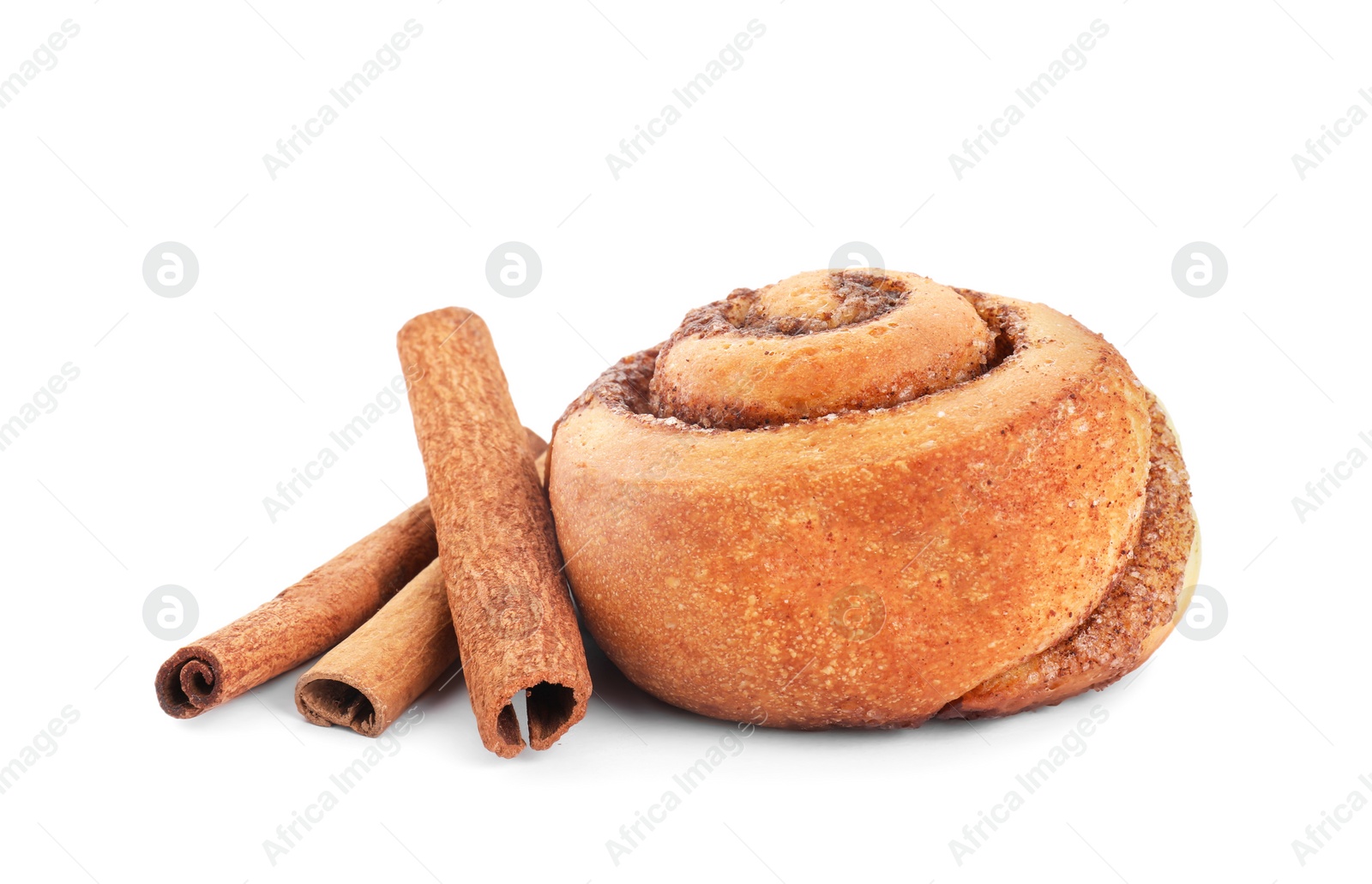 Photo of One tasty cinnamon roll and sticks isolated on white