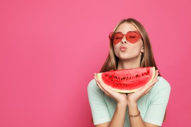 Photo of Beautiful girl with slice of watermelon on crimson background. Space for text