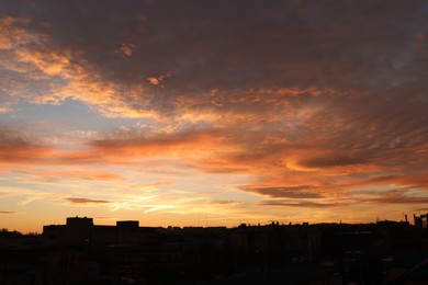 Photo of Picturesque view of beautiful sunset over city