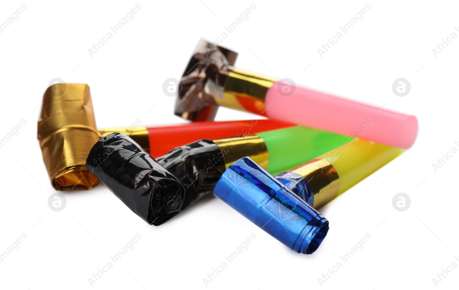 Photo of Bright party blowers on white background. Festive items