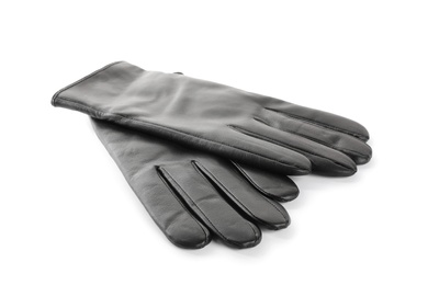 Photo of Stylish black leather gloves on white background