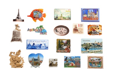 Photo of MYKOLAIV, UKRAINE - DECEMBER 24, 2018: Many different travel magnets on white background