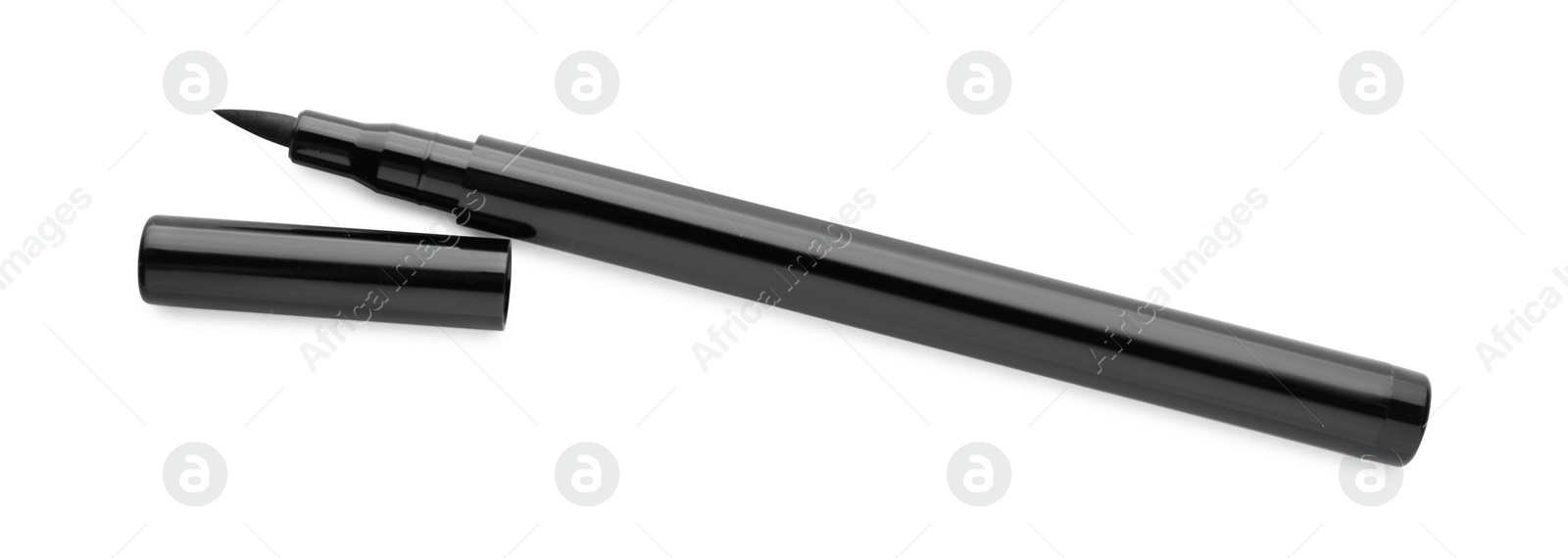 Photo of Black eyeliner isolated on white, top view. Makeup product