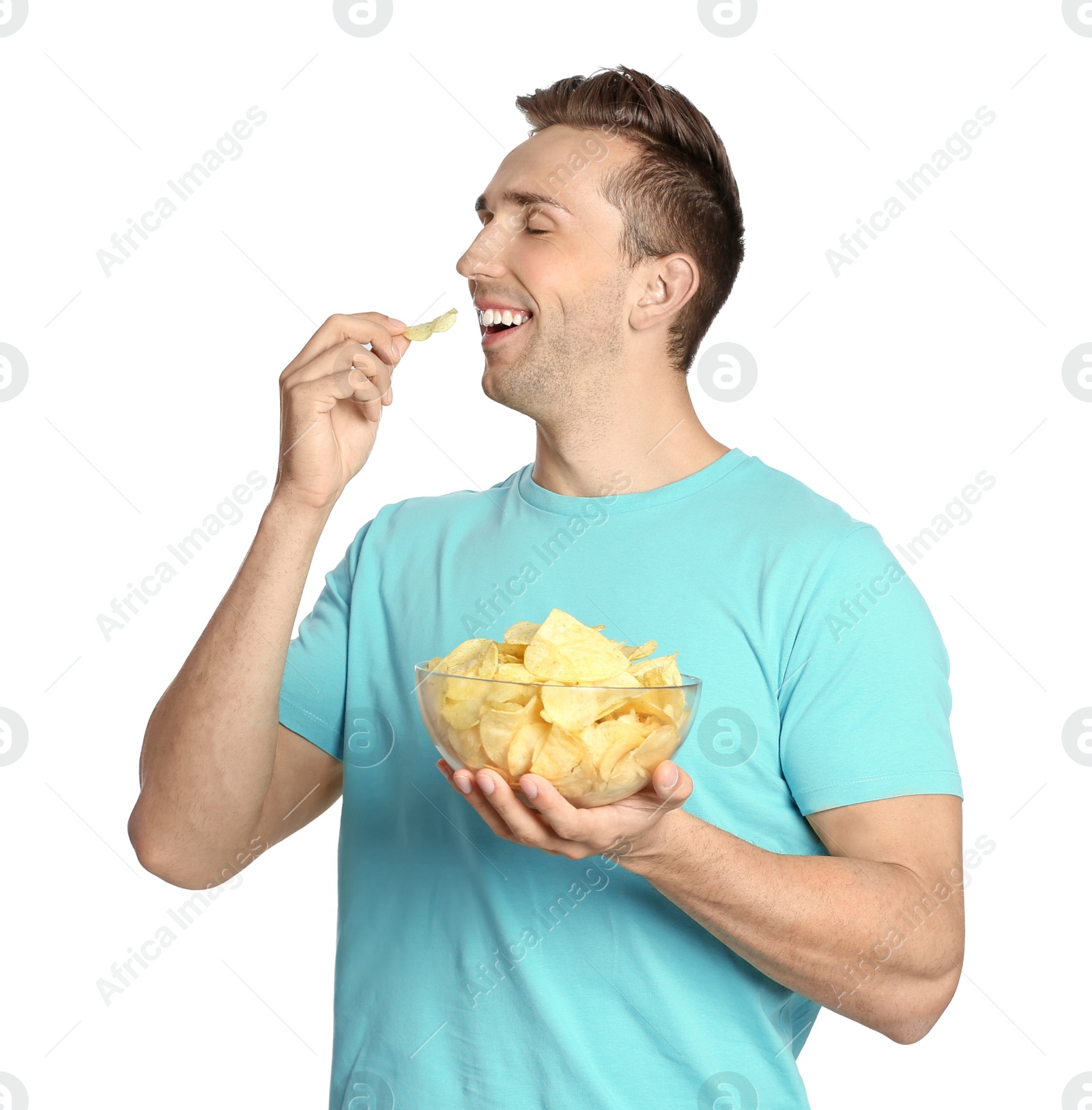 Photo of Man eating potato chips on white background