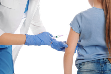 Little girl receiving chickenpox vaccination on white background, closeup. Varicella virus prevention