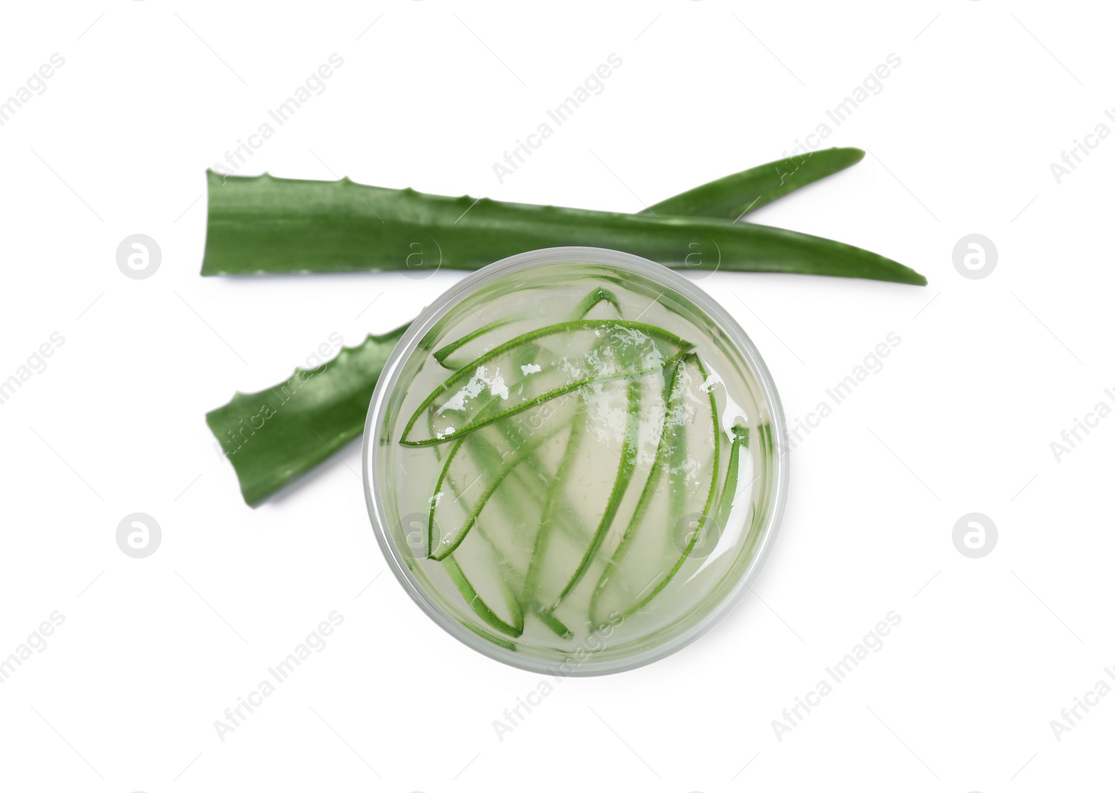 Photo of Tasty aloe juice in glass and cut leaves isolated on white, top view