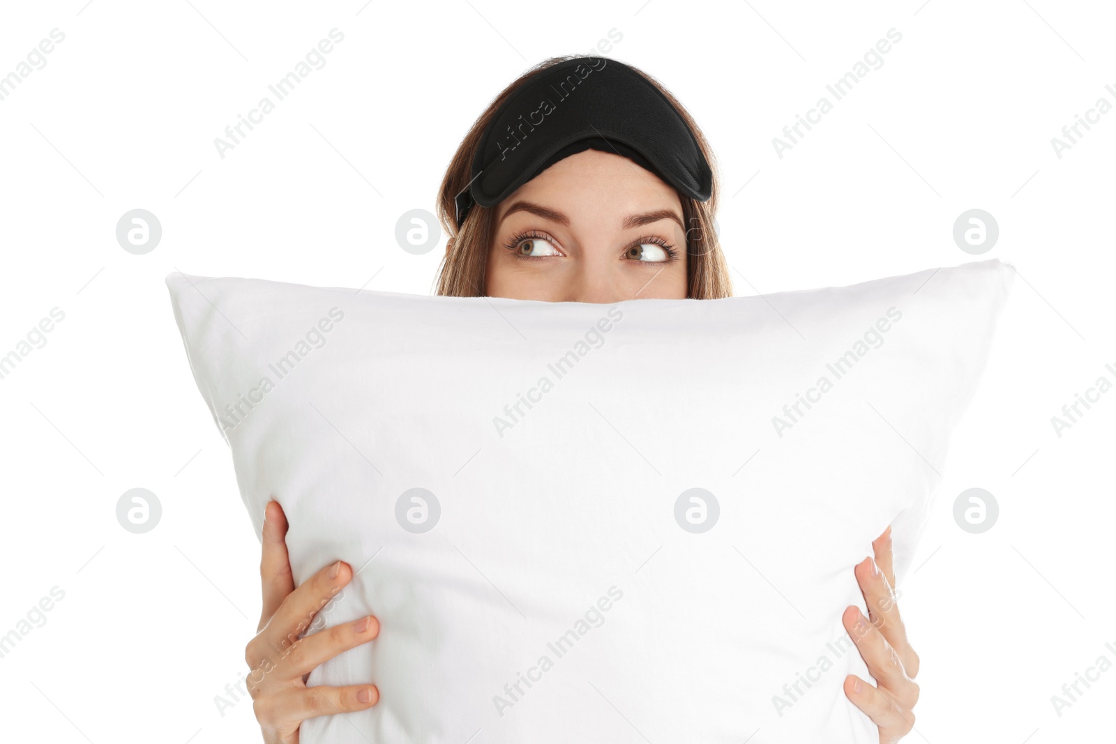 Photo of Beautiful woman with pillow and sleep mask on white background. Bedtime