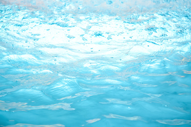 Photo of View of water splashing in swimming pool