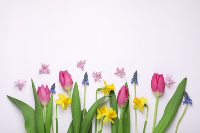 Photo of Beautiful flowers on white background, flat lay. Space for text