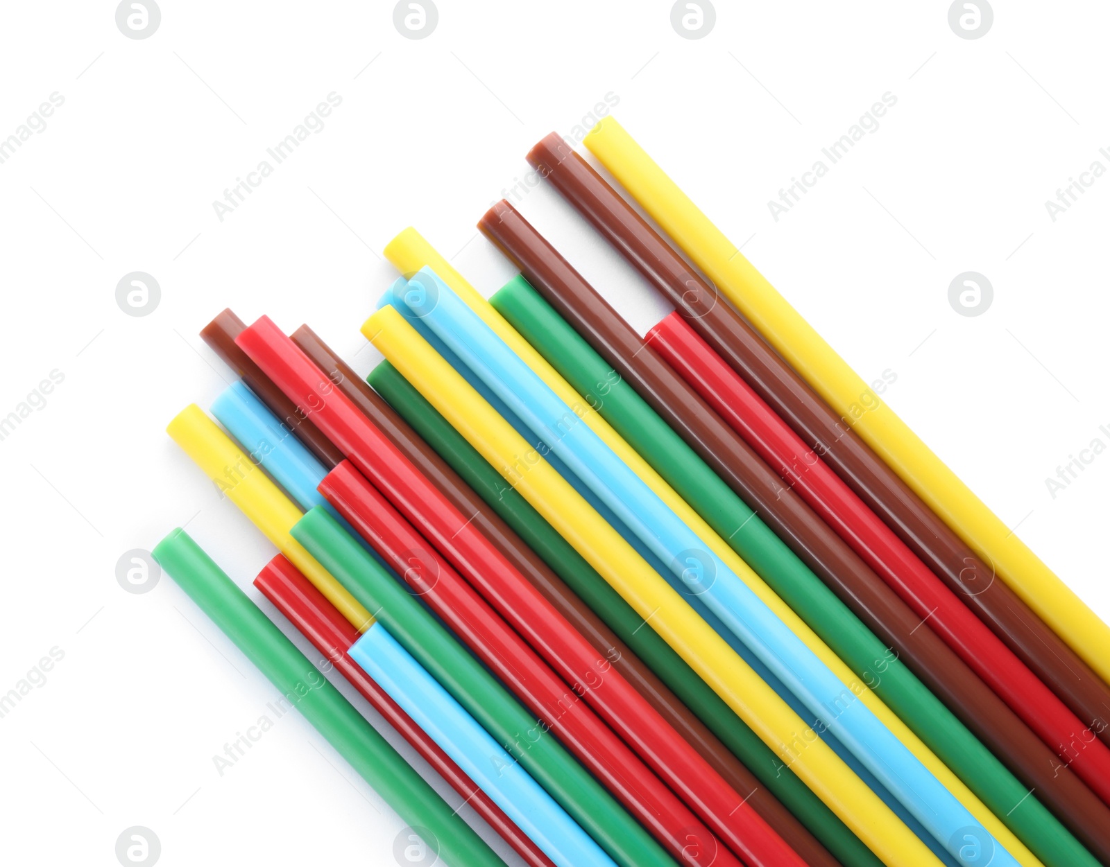 Photo of Many colorful glue sticks on white background, top view