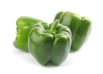 Photo of Fresh ripe green bell peppers isolated on white