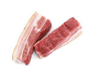 Photo of Piecesraw pork belly isolated on white, top view