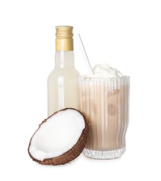 Photo of Bottle of delicious syrup, coconut and glass of iced coffee isolated on white