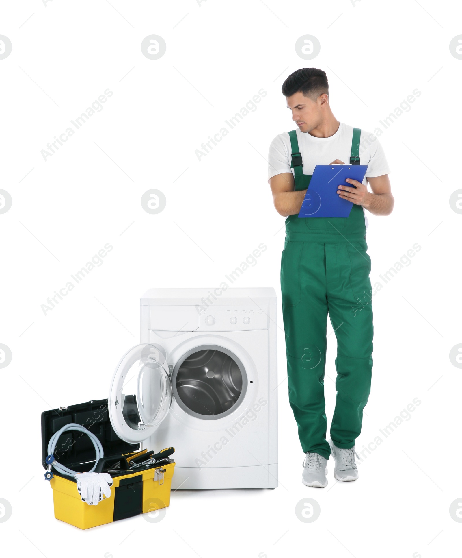 Photo of Repairman with clipboard and toolbox near washing machine on white background