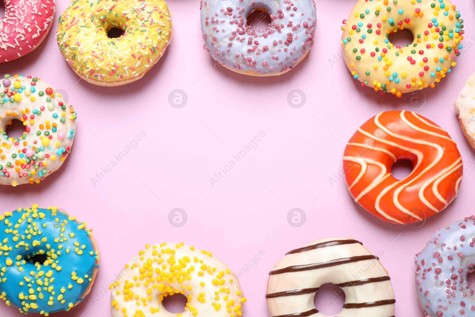 Photo of Delicious glazed donuts on lilac background, flat lay. Space for text