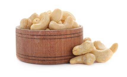 Photo of Bowl and tasty organic cashew nuts isolated on white