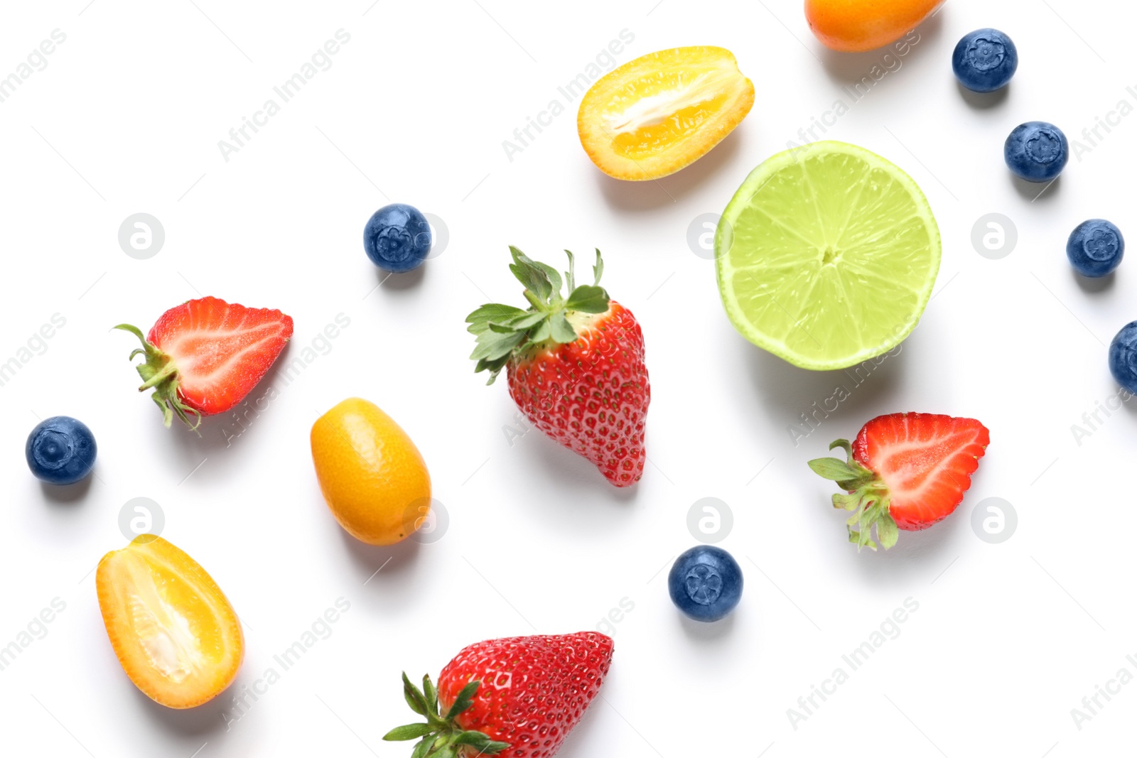 Photo of Fresh fruits and berries on white background, top view