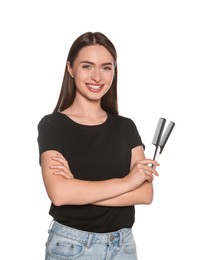 Photo of Portrait of happy hairdresser with professional combs on white background