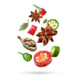 Image of Different aromatic spices falling on white background