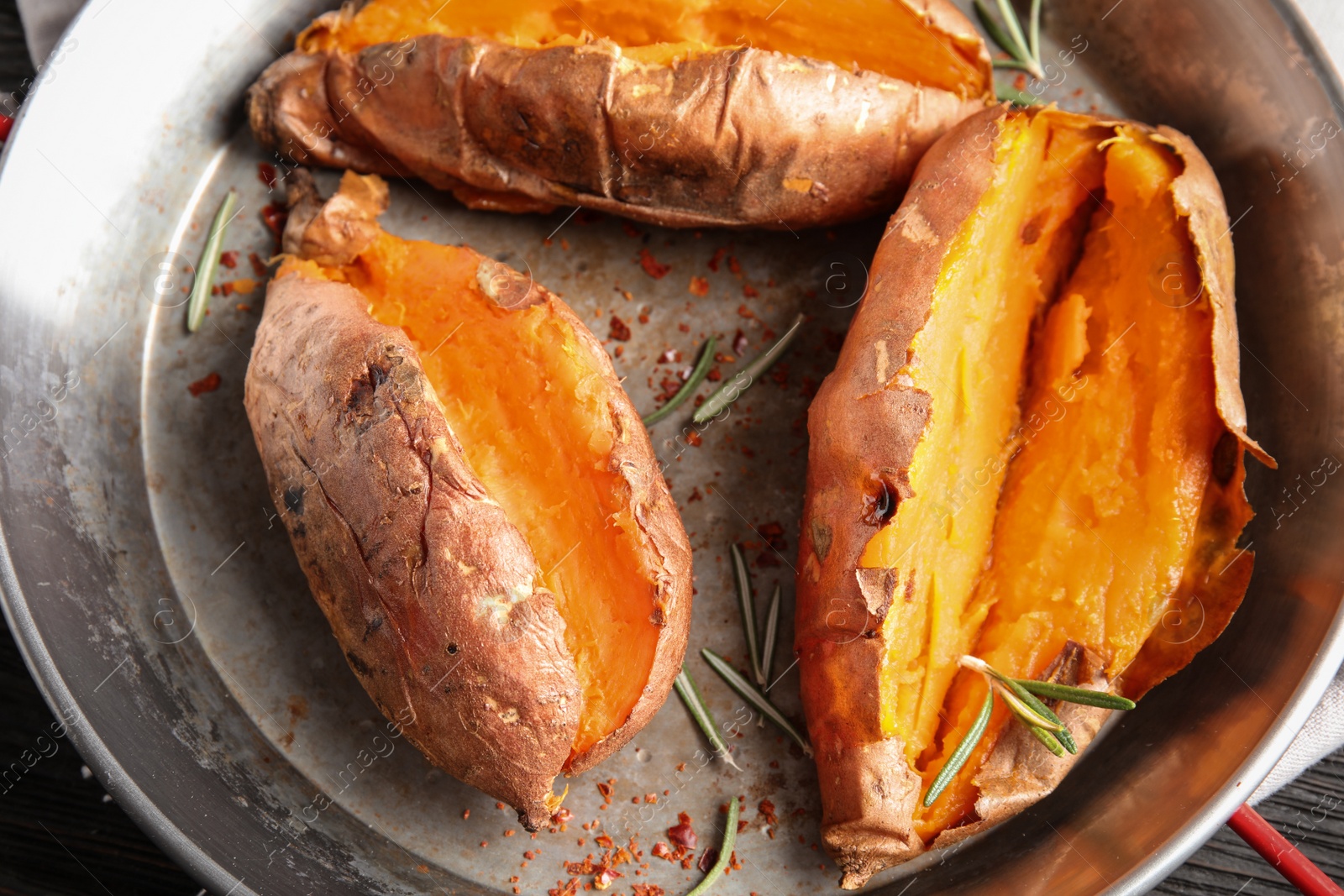 Photo of Dish with baked sweet potatoes, top view