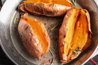 Dish with baked sweet potatoes, top view