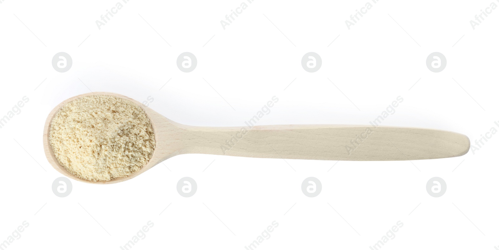 Photo of Spoon of sesame flour isolated on white, top view