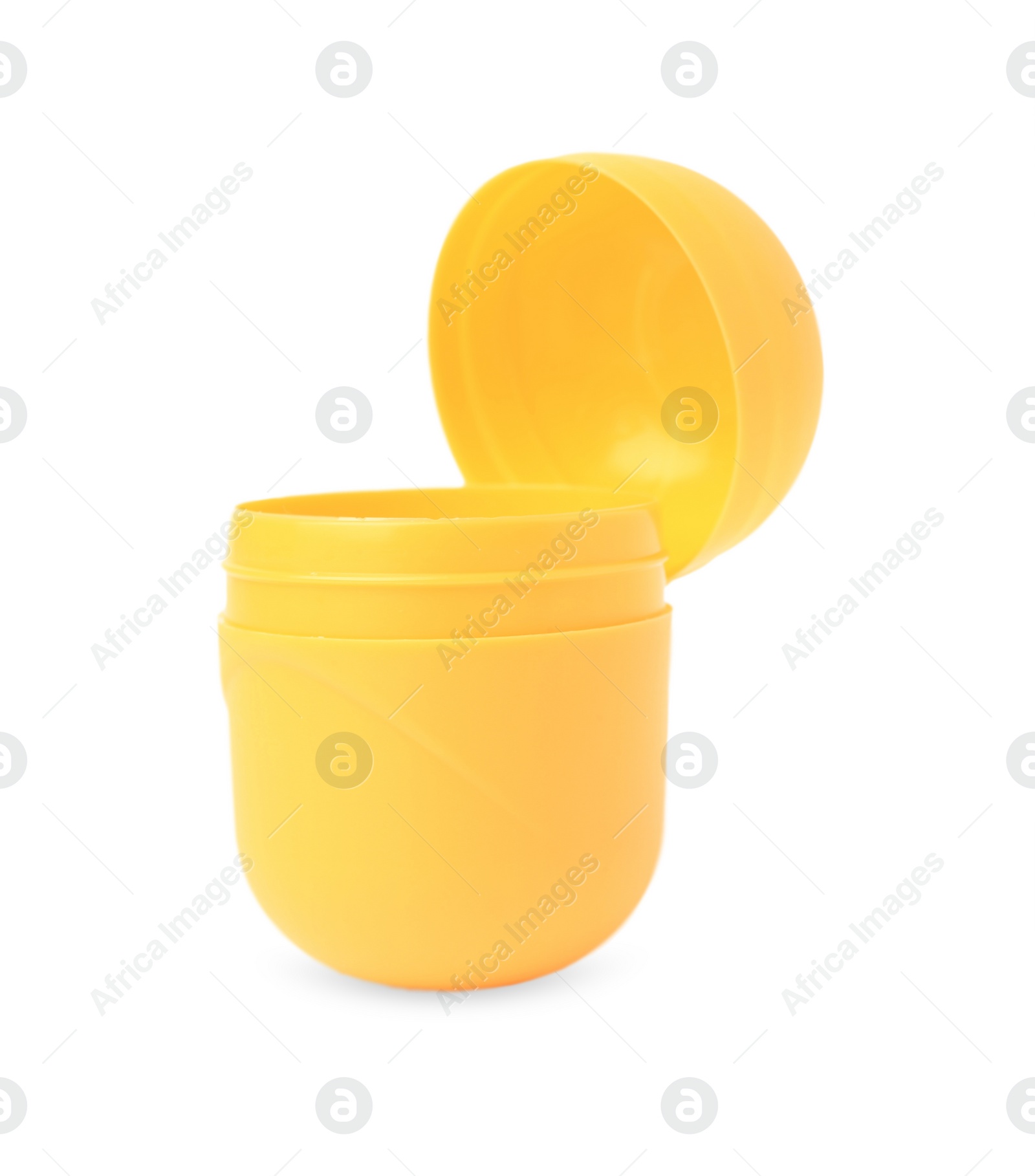 Photo of Slynchev Bryag, Bulgaria - May 23, 2023: Opened yellow plastic capsule from Kinder Surprise Egg isolated on white