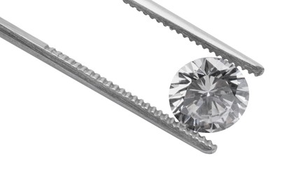 Tweezers with beautiful shiny diamond isolated on white