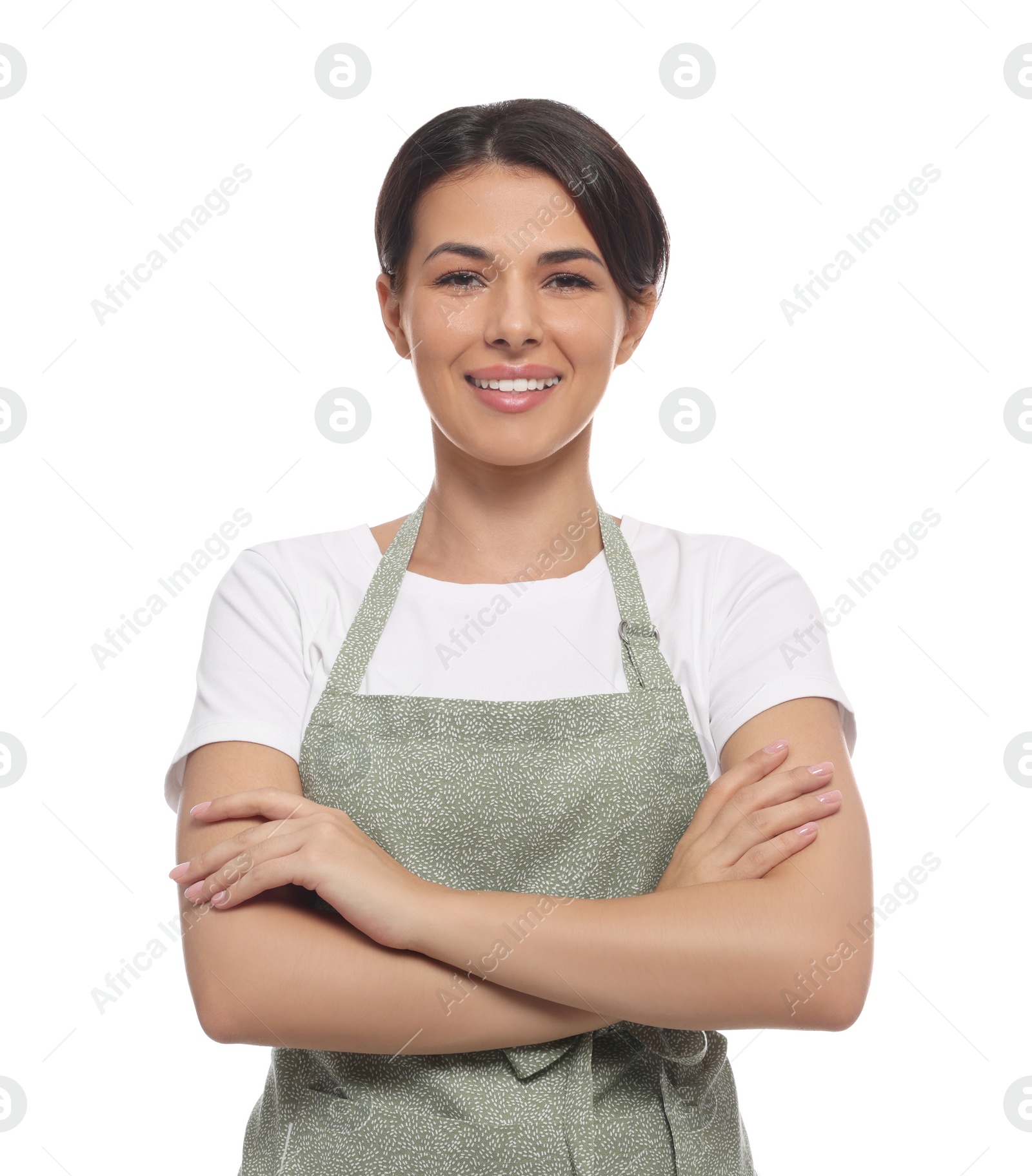 Photo of Young woman in green apron on white background