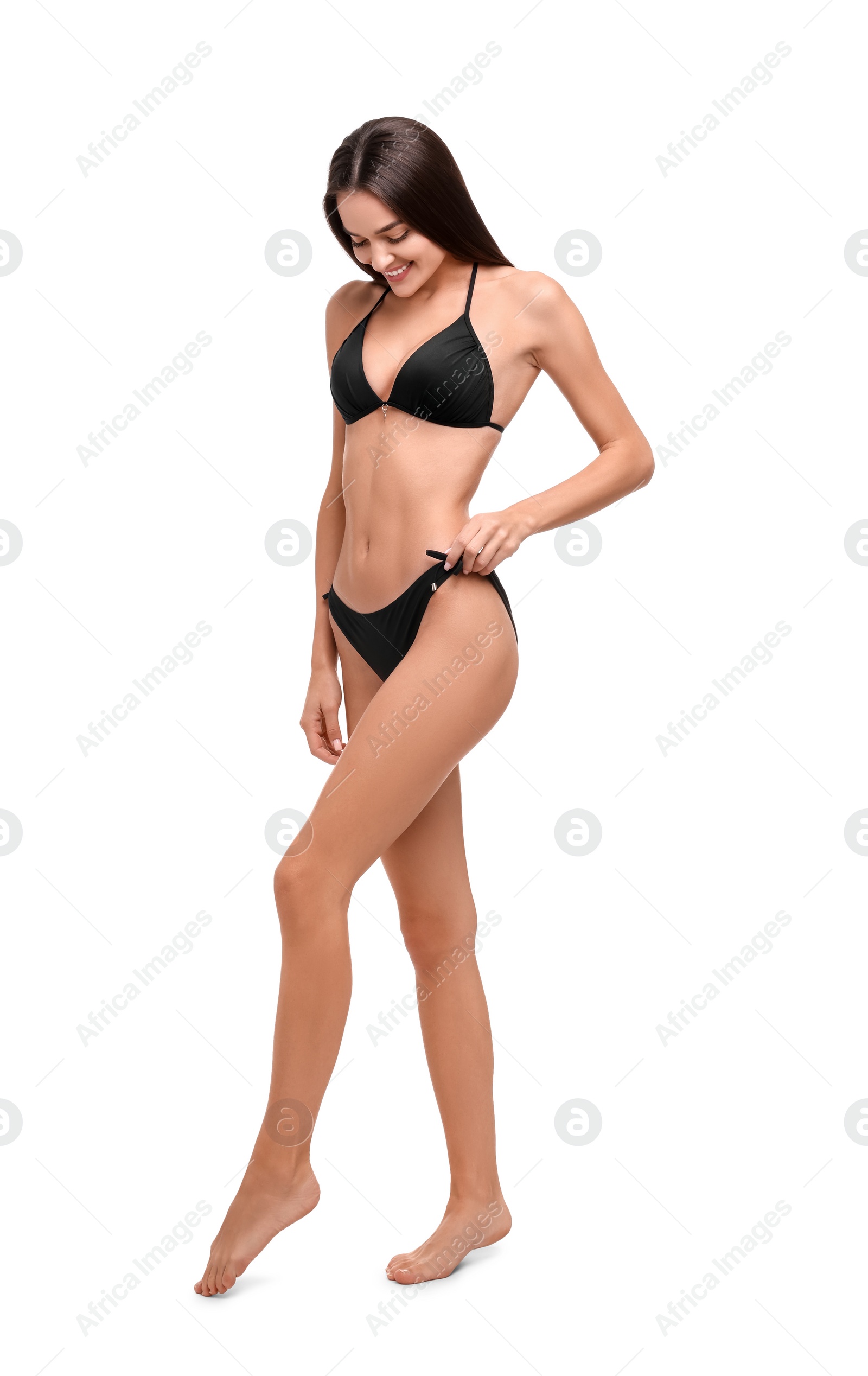 Photo of Young woman in stylish bikini isolated on white