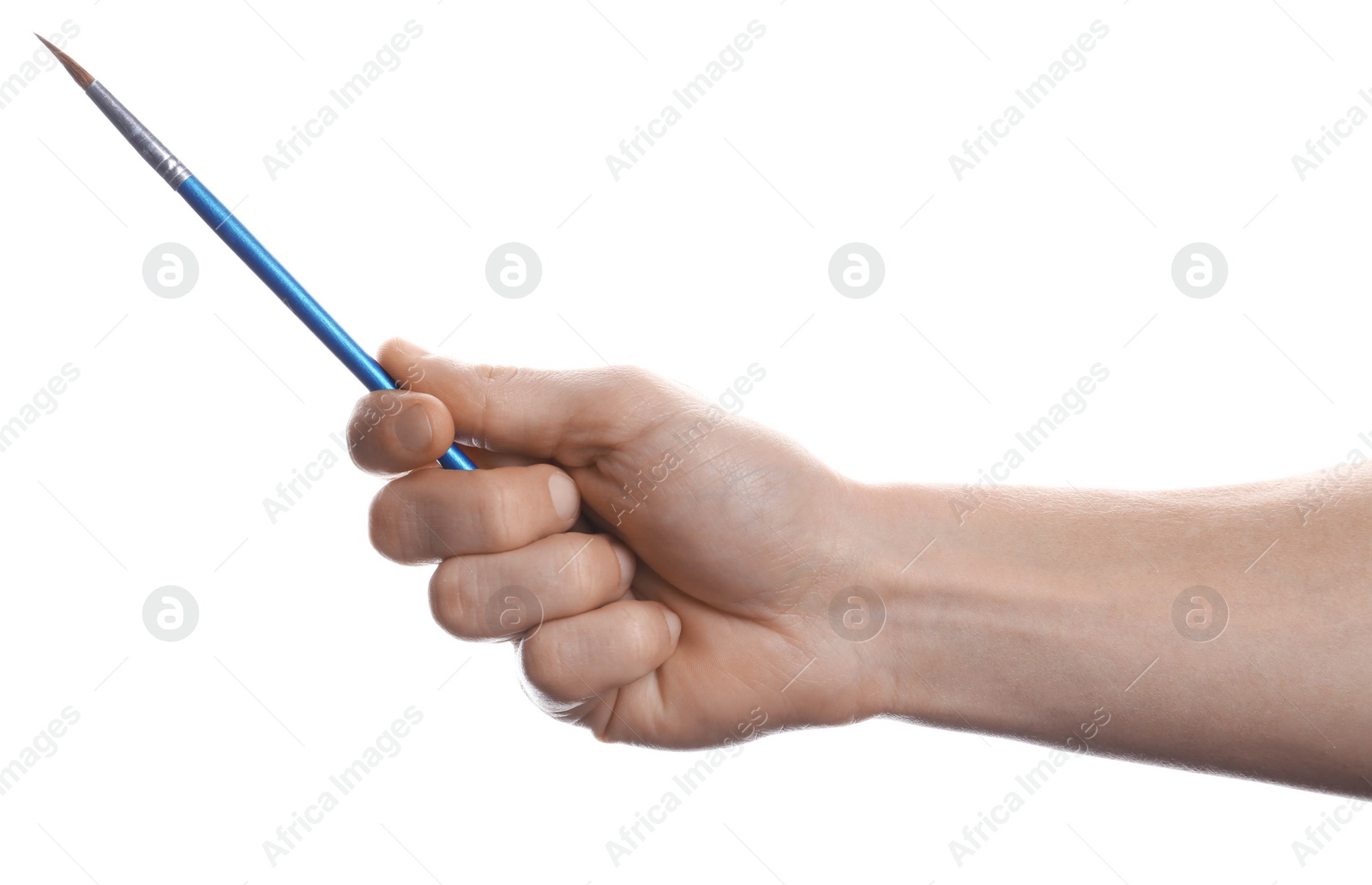 Photo of Man holding paint brush on white background, closeup