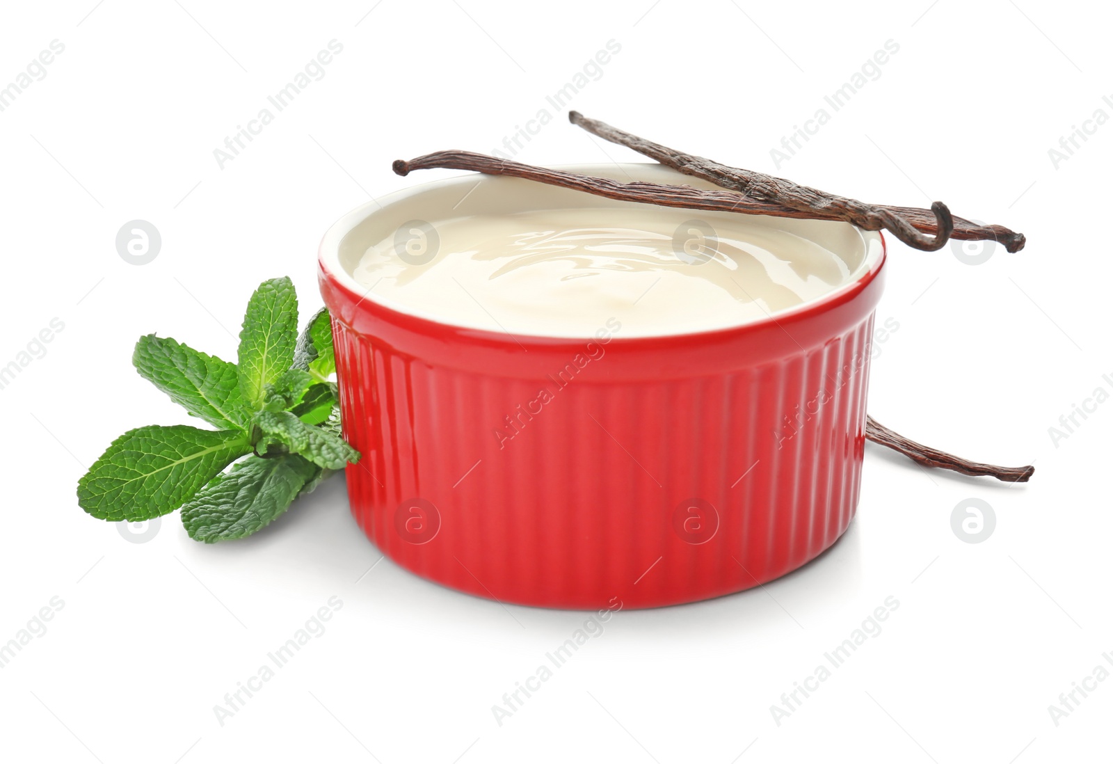 Photo of Vanilla pudding, sticks and fresh mint on white background