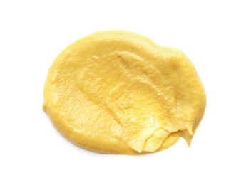 Photo of Smear of delicious mustard isolated on white, top view