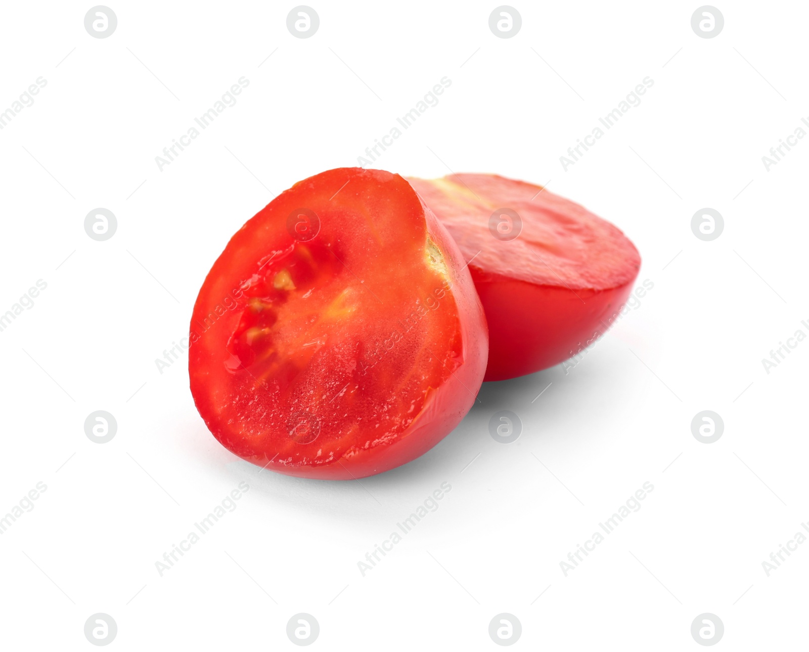 Photo of Cut red tomato on white background