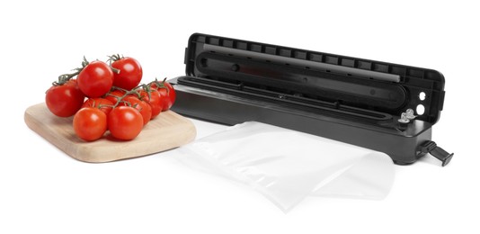 Photo of Sealer for vacuum packing, plastic bag and cherry tomatoes on white background