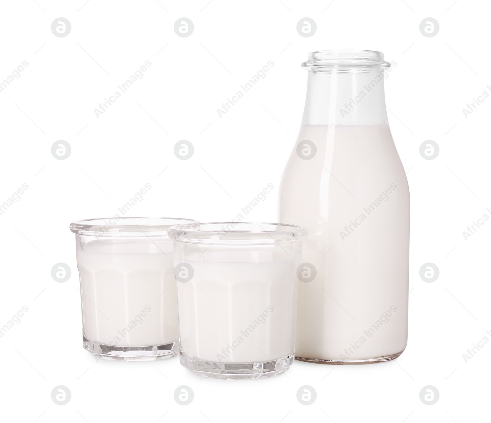 Photo of Glassware with tasty milk isolated on white