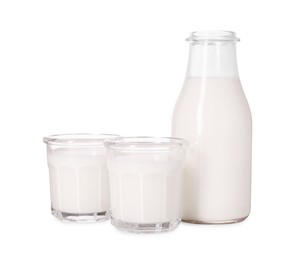 Glassware with tasty milk isolated on white