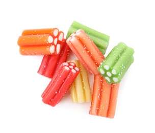 Pile of tasty colorful jelly candies on white background, top view