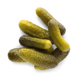 Photo of Pile of tasty pickled cucumbers on white background, top view