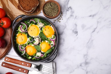 Photo of Tasty Shakshouka served on white marble table, flat lay. Space for text