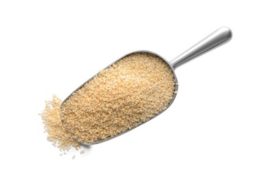Photo of Metal scoop with sesame seeds on white background, top view