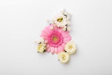 Photo of Number 4 made of beautiful flowers on white background, top view