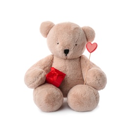 Photo of Cute teddy bear with red heart and gift box on white background. Valentine's day celebration