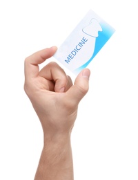 Photo of Man holding business card isolated on white, closeup. Dental medical service